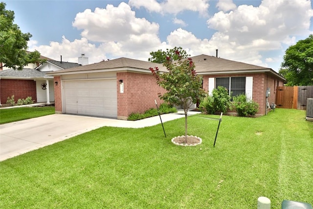3919 Haleys Way, Round Rock, TX 78665 - single story home with brick siding, an attached garage, and concrete driveway