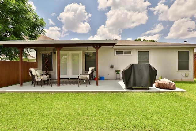 3919 Haleys Way, Round Rock, TX 78665 - rear view of property featuring french doors and a patio area