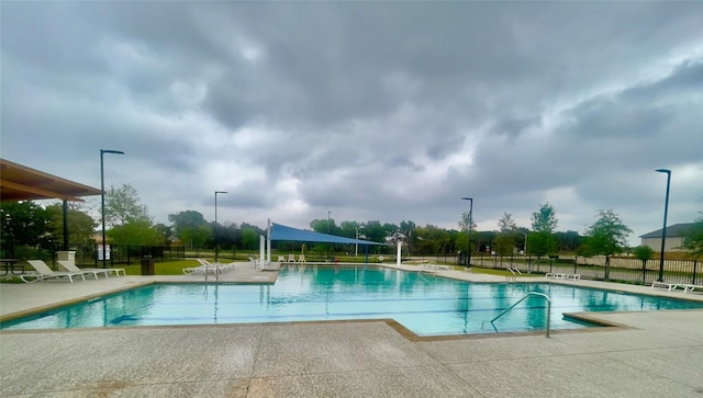 2316 Gold Dust Trl, Leander, TX 78641 - community pool featuring a patio