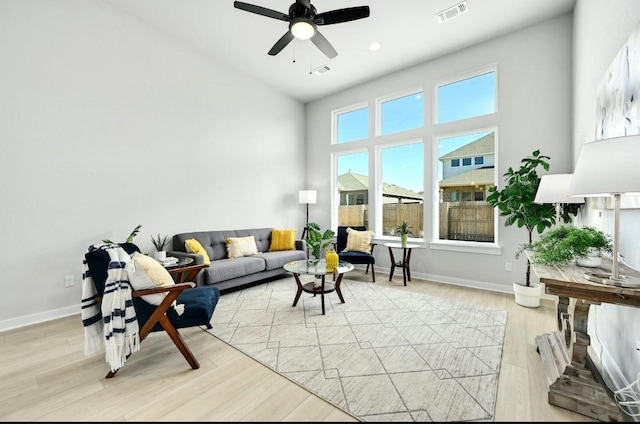 2316 Gold Dust Trl, Leander, TX 78641 - living area with ceiling fan, light wood-type flooring, and a towering ceiling