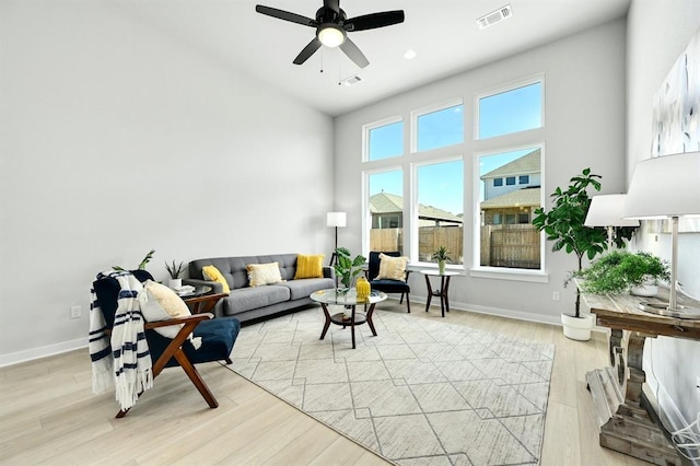 2316 Gold Dust Trl, Leander, TX 78641 - living area with a ceiling fan and light wood-style floors