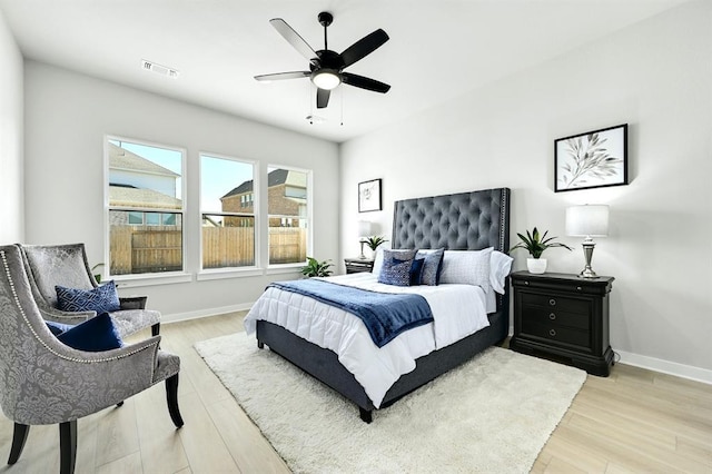 2316 Gold Dust Trl, Leander, TX 78641 - bedroom with light wood-type flooring and a ceiling fan
