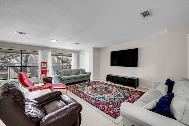207 Lasso St, Horseshoe Bay, TX 78657 - carpeted living room featuring baseboards
