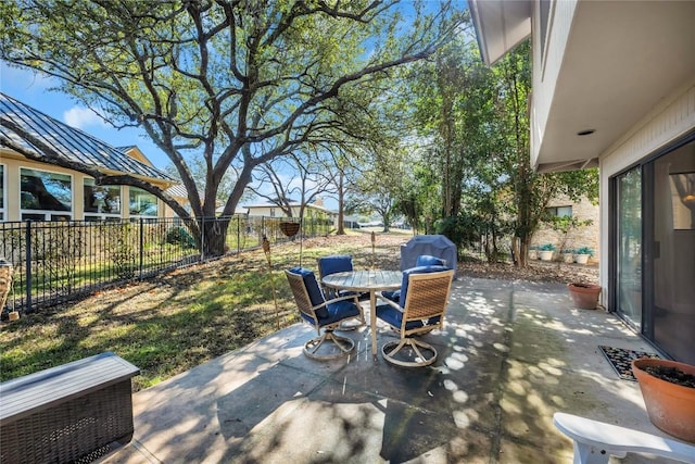 207 Lasso St, Horseshoe Bay, TX 78657 - view of patio / terrace with outdoor dining area and a grill