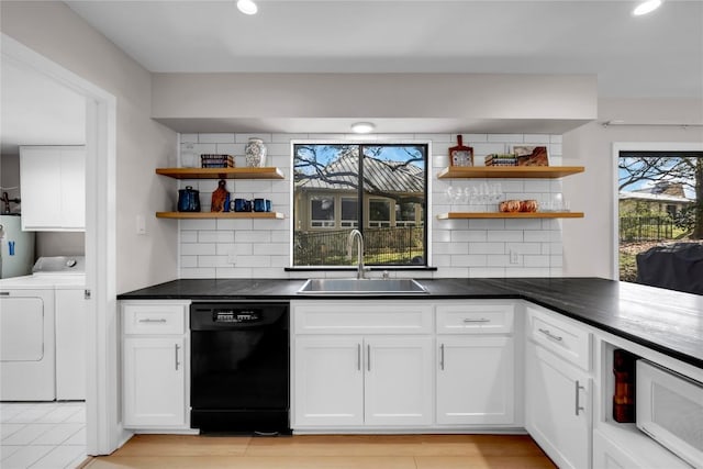 207 Lasso St, Horseshoe Bay, TX 78657 - kitchen with black dishwasher, open shelves, tasteful backsplash, white microwave, and recessed lighting