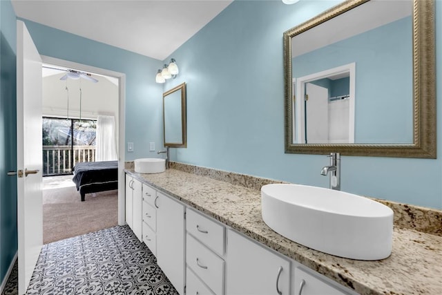 207 Lasso St, Horseshoe Bay, TX 78657 - full bathroom featuring double vanity, ceiling fan, and ensuite bath