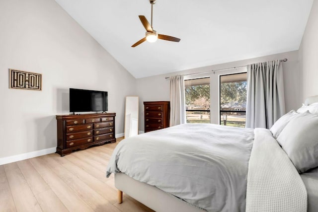 207 Lasso St, Horseshoe Bay, TX 78657 - bedroom featuring wood finished floors, high vaulted ceiling, and a ceiling fan