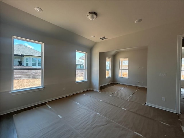 8213 Grenadier Dr, Austin, TX 78738 - unfurnished room featuring baseboards and vaulted ceiling