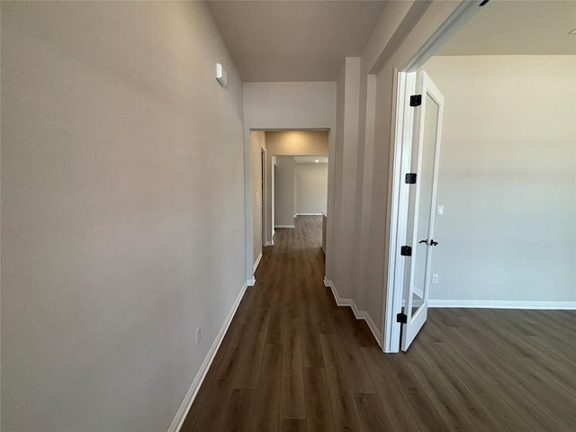 8213 Grenadier Dr, Austin, TX 78738 - corridor with dark wood-type flooring and baseboards