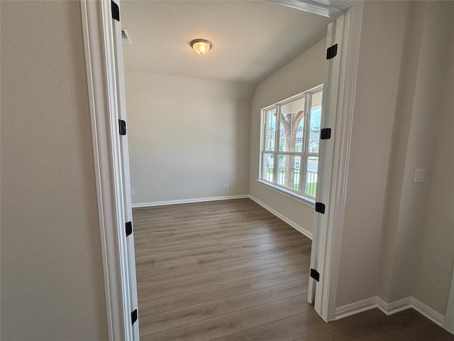 8213 Grenadier Dr, Austin, TX 78738 - unfurnished room with wood finished floors and baseboards