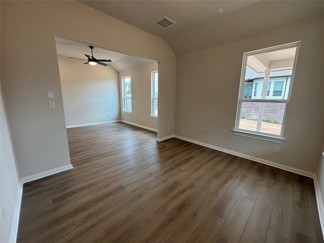 8213 Grenadier Dr, Austin, TX 78738 - unfurnished room with dark wood-style floors, lofted ceiling, and ceiling fan