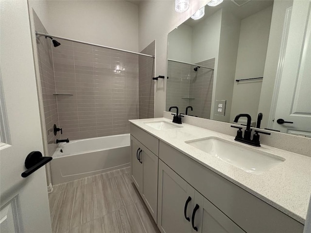 8213 Grenadier Dr, Austin, TX 78738 - bathroom featuring double vanity and shower / tub combination