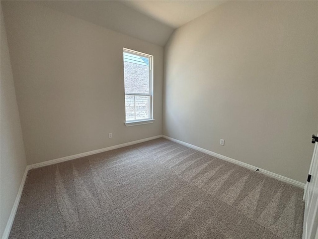 8213 Grenadier Dr, Austin, TX 78738 - carpeted empty room with vaulted ceiling and baseboards