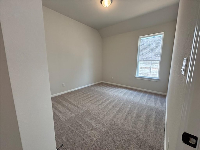 8213 Grenadier Dr, Austin, TX 78738 - carpeted spare room featuring baseboards and vaulted ceiling