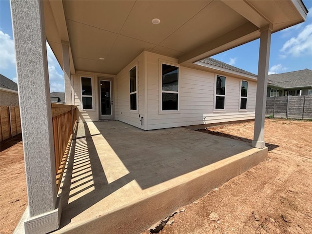 8213 Grenadier Dr, Austin, TX 78738 - fenced backyard with a patio area