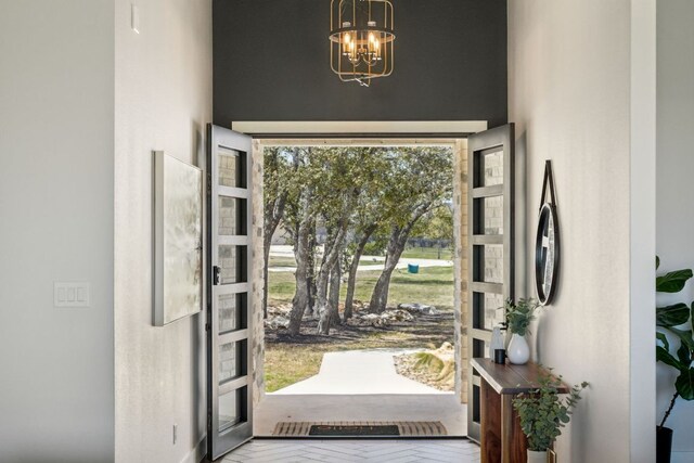 308 Somerset Hills Dr, Georgetown, TX 78633 - entrance foyer featuring a chandelier and a high ceiling