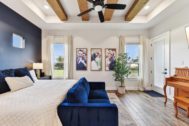 308 Somerset Hills Dr, Georgetown, TX 78633 - bedroom with beam ceiling, wood finished floors, multiple windows, a ceiling fan, and recessed lighting