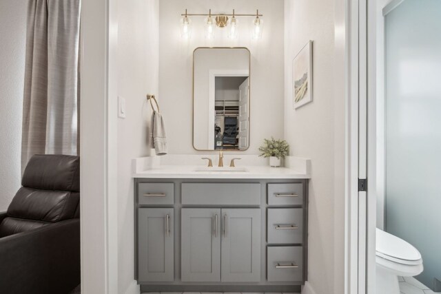 308 Somerset Hills Dr, Georgetown, TX 78633 - bathroom with vanity and toilet