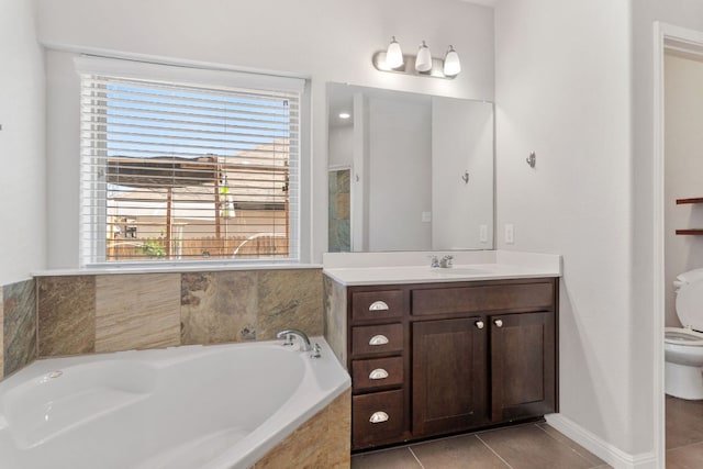13601 Larrys Ln, Manchaca, TX 78652 - full bathroom featuring tile patterned floors, toilet, vanity, and a bath