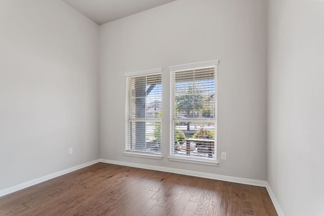 13601 Larrys Ln, Manchaca, TX 78652 - spare room featuring baseboards and wood finished floors
