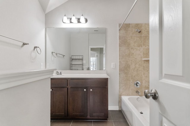 13601 Larrys Ln, Manchaca, TX 78652 - full bath with lofted ceiling,  shower combination, tile patterned flooring, and vanity