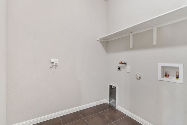 13601 Larrys Ln, Manchaca, TX 78652 - clothes washing area featuring hookup for a gas dryer, electric dryer hookup, laundry area, dark tile patterned floors, and hookup for a washing machine
