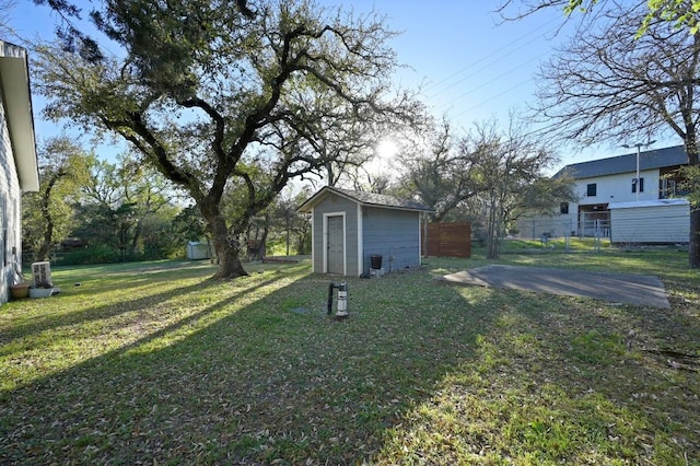 11100 Centennial Trl, Austin, TX 78726 - view of yard featuring a storage unit