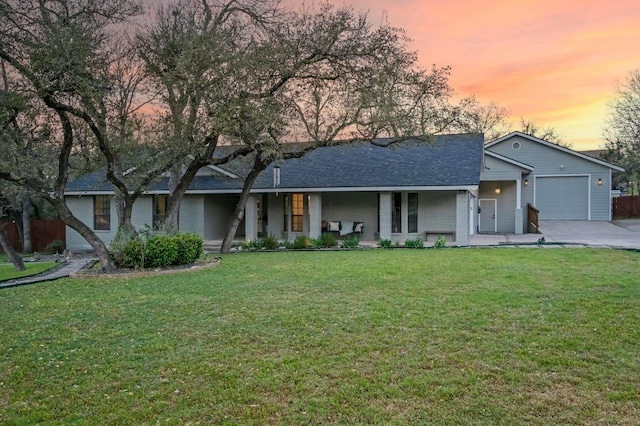 11100 Centennial Trl, Austin, TX 78726 - single story home with a garage, concrete driveway, covered porch, brick siding, and roof with shingles