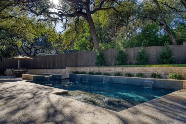 2610 Allston Ln, Austin, TX 78746 - view of swimming pool with a fenced backyard, a pool with connected hot tub, and a patio