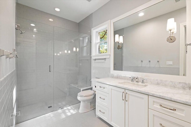 2610 Allston Ln, Austin, TX 78746 - bathroom featuring vanity, a stall shower, tile patterned flooring, and recessed lighting