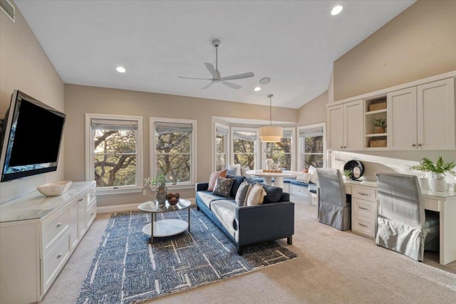 2610 Allston Ln, Austin, TX 78746 - living area featuring light colored carpet, ceiling fan, vaulted ceiling, recessed lighting, and a desk