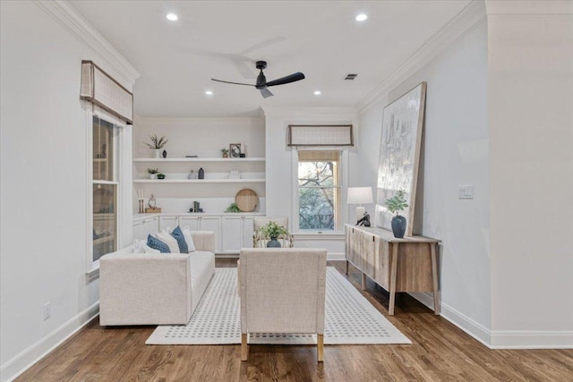 2610 Allston Ln, Austin, TX 78746 - living area with ceiling fan, wood finished floors, crown molding, and recessed lighting