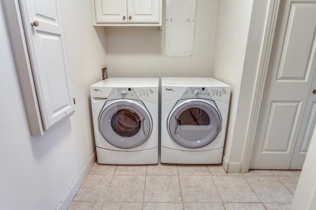 2308 Cypress Pt E, Austin, TX 78746 - laundry room with cabinet space, washer and dryer, light tile patterned floors, and baseboards