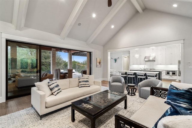 4229 Verano Dr, Austin, TX 78735 - living room with light wood-style flooring, high vaulted ceiling, beam ceiling, recessed lighting, and a ceiling fan
