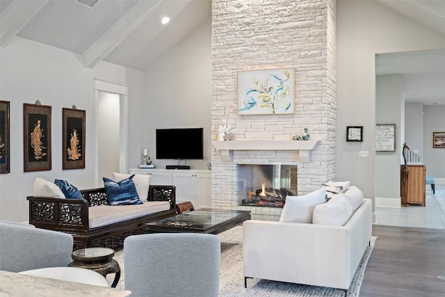 4229 Verano Dr, Austin, TX 78735 - living area featuring high vaulted ceiling, wood finished floors, beamed ceiling, a fireplace, and recessed lighting