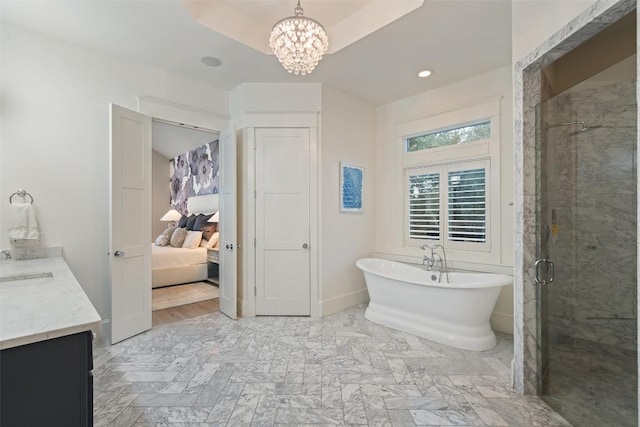 4229 Verano Dr, Austin, TX 78735 - bathroom featuring a freestanding bath, vanity, a chandelier, a stall shower, and ensuite bathroom