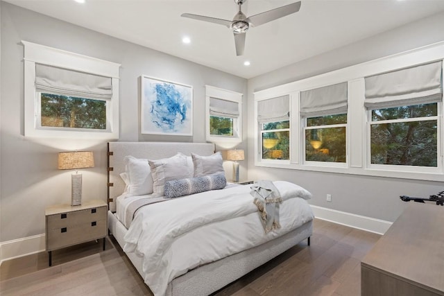 4229 Verano Dr, Austin, TX 78735 - bedroom featuring wood finished floors, recessed lighting, a ceiling fan, and multiple windows