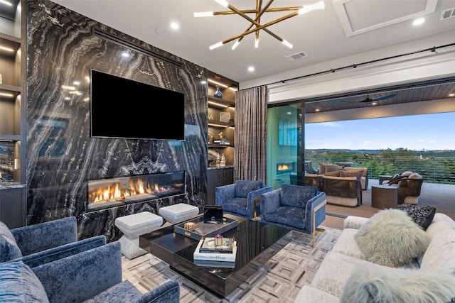 4229 Verano Dr, Austin, TX 78735 - living room with a fireplace, built in features, and recessed lighting