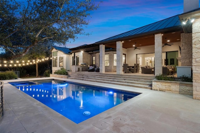 4229 Verano Dr, Austin, TX 78735 - pool at dusk with ceiling fan, an outdoor pool, and a patio area