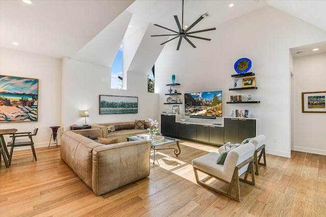 2010 Goodrich Ave Unit 8A, Austin, TX 78704 - living area featuring high vaulted ceiling, ceiling fan, light wood-type flooring, and recessed lighting