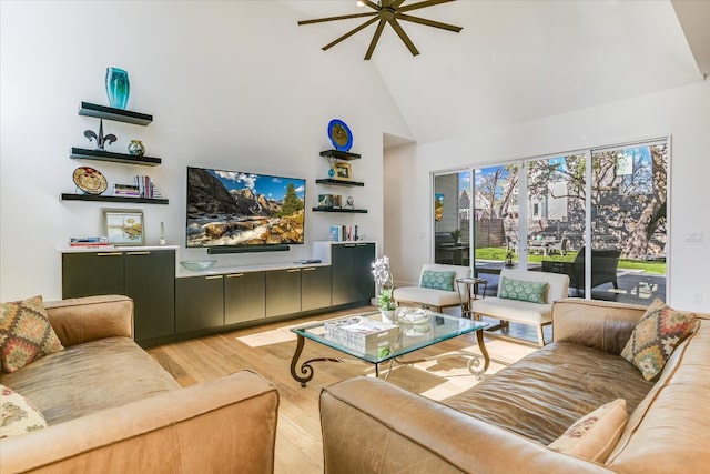 2010 Goodrich Ave Unit 8A, Austin, TX 78704 - living area featuring high vaulted ceiling, ceiling fan, and light wood-style flooring