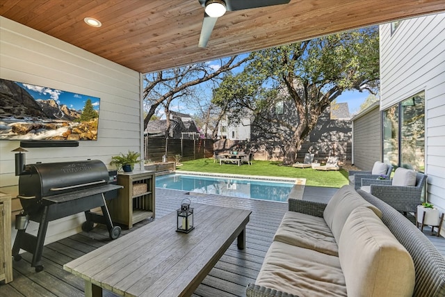 2010 Goodrich Ave Unit 8A, Austin, TX 78704 - wooden terrace with an outdoor living space, a fenced backyard, grilling area, and a ceiling fan