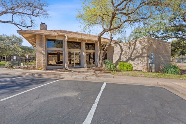 8113 W Ct, Austin, TX 78759 - view of property featuring uncovered parking