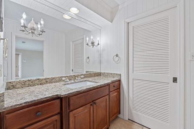 8113 W Ct, Austin, TX 78759 - bathroom with a chandelier, vanity, and tile patterned flooring