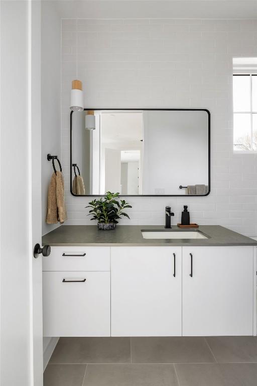3607 Garden Villa Ln, Austin, TX 78704 - bathroom with vanity and tile patterned flooring