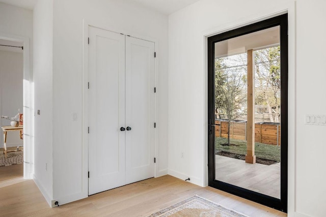 3607 Garden Villa Ln, Austin, TX 78704 - unfurnished bedroom with light wood-style flooring, access to outside, and a closet