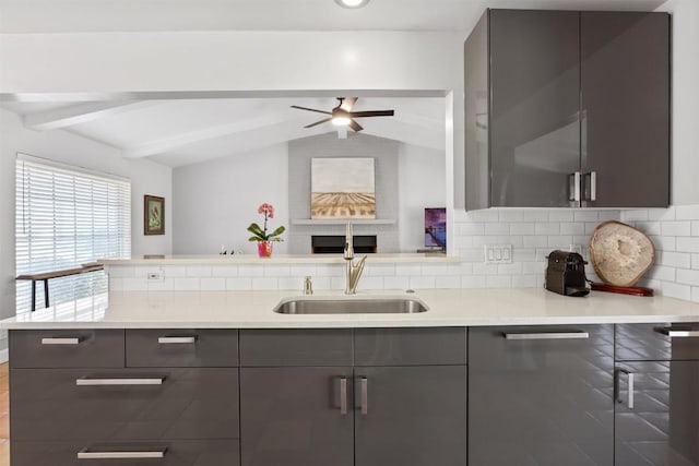 1908 Running Brook Dr, Austin, TX 78723 - kitchen featuring gray cabinets, a sink, modern cabinets, and light countertops