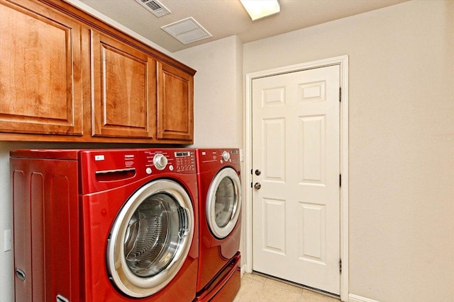 412 Madisons Way, Cedar Park, TX 78613 - laundry area featuring separate washer and dryer, cabinet space, and light tile patterned floors