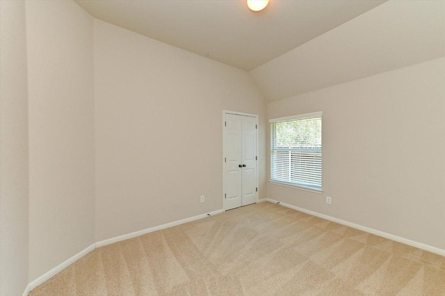 412 Madisons Way, Cedar Park, TX 78613 - unfurnished room featuring light carpet, baseboards, and vaulted ceiling