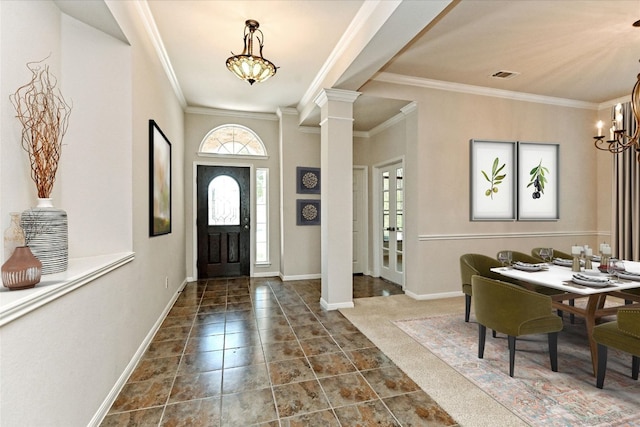 412 Madisons Way, Cedar Park, TX 78613 - entryway with a chandelier, ornate columns, crown molding, baseboards, and dark tile patterned flooring